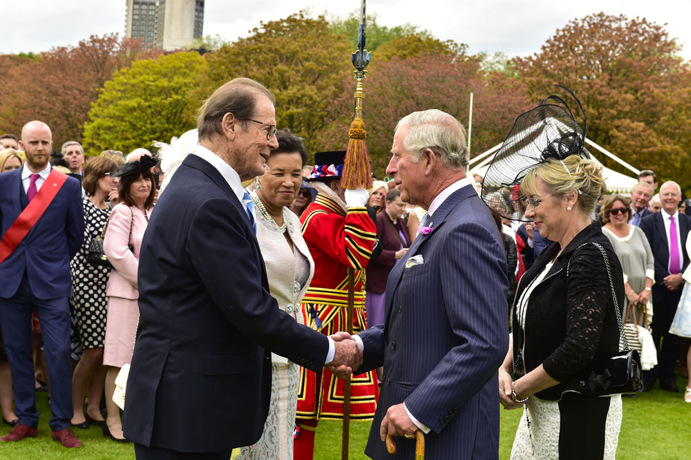 HRH Prince of Wales with Roger Moore at The Prince's Trust 40th Anniversary Buckingham Palace Garden Party